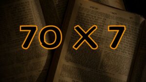 70 X 7 com escritos hebraicos como background